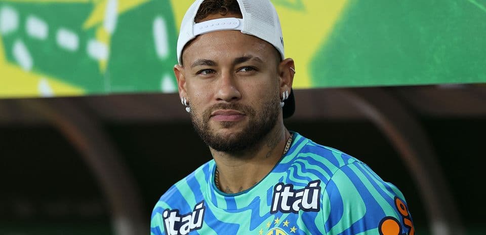 Player wearing Brazil team jersey on bench