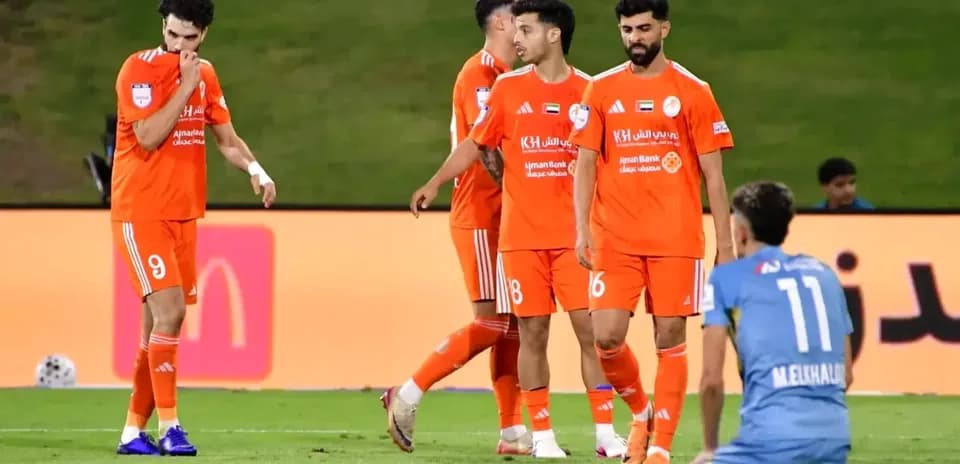Ajman U23 players on the field during match