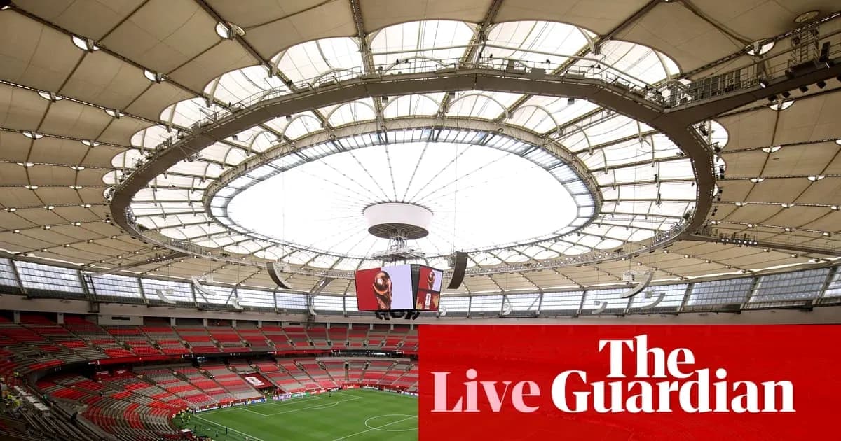 Interior view of a large stadium with roof