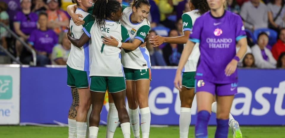 Denver Summit W players celebrating a goal