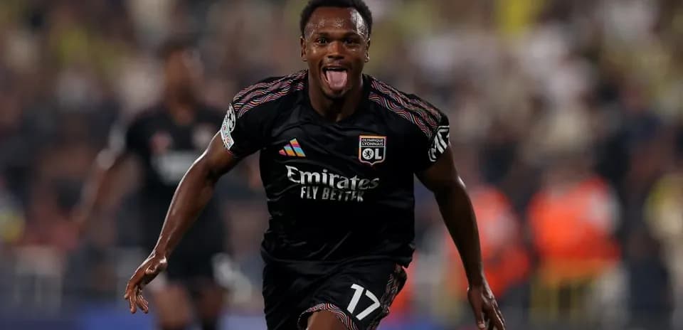 Lyon player celebrating goal during match