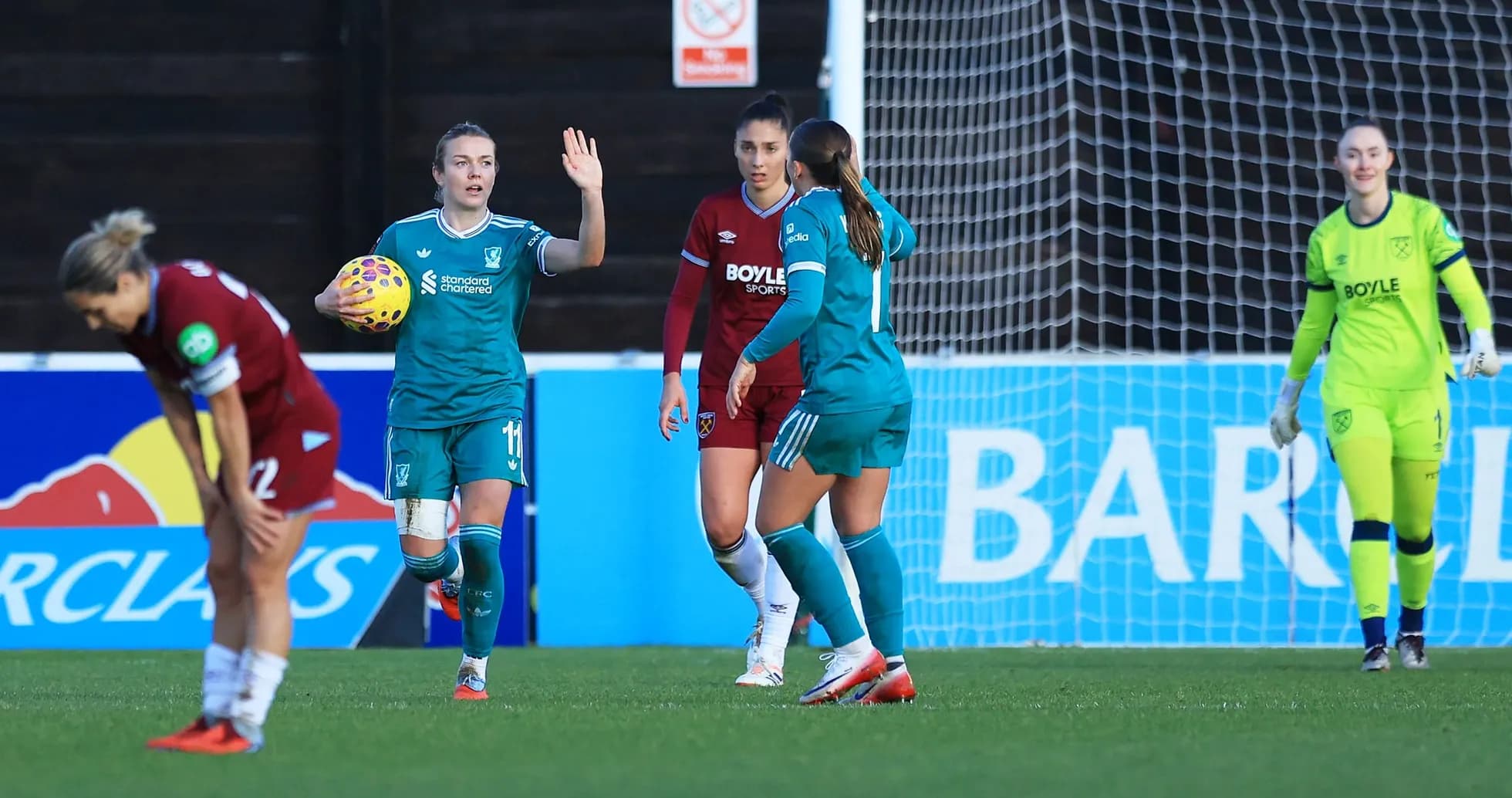 Liverpool player signaling during FA WSL match
