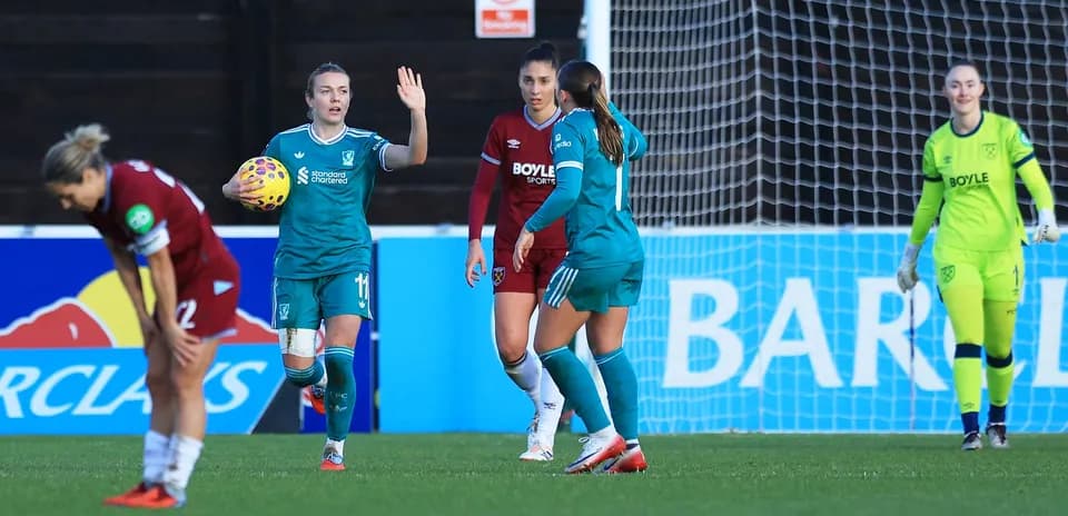 Liverpool player signaling during FA WSL match