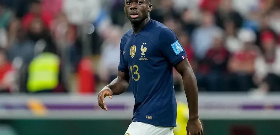 Player wearing France kit during match in stadium