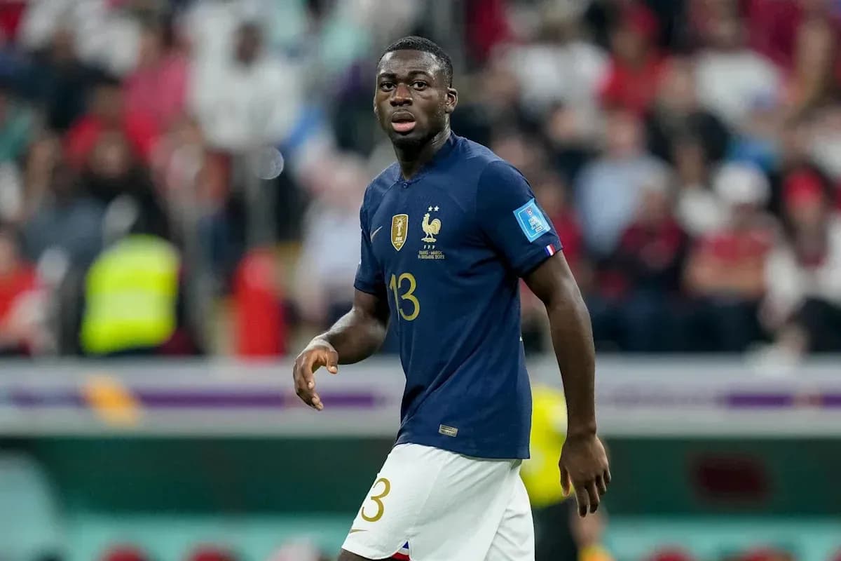 Player wearing France kit during match in stadium
