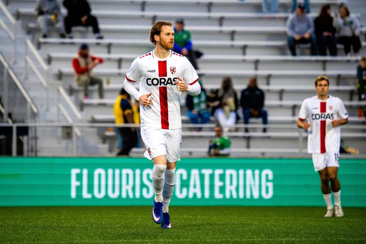 Player running on the field during match