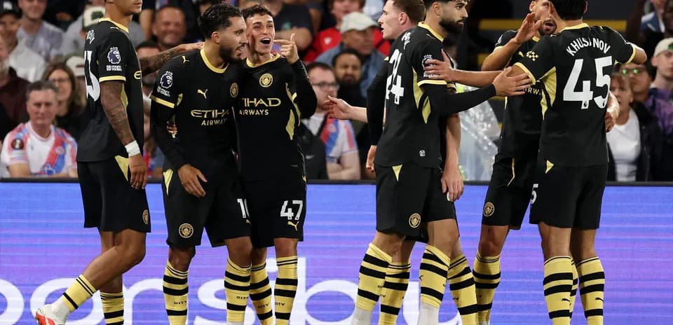 Manchester City players celebrating a goal