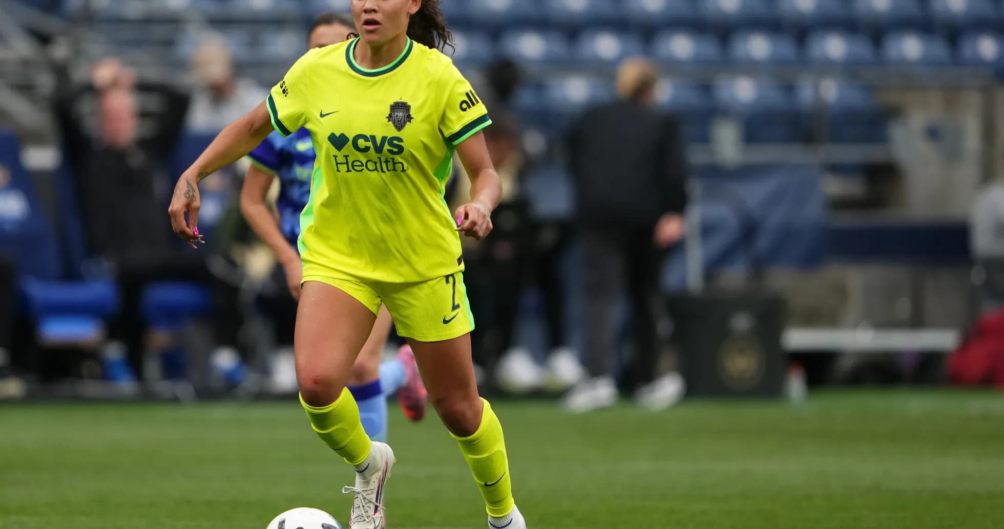 Player dribbling ball during NWSL match