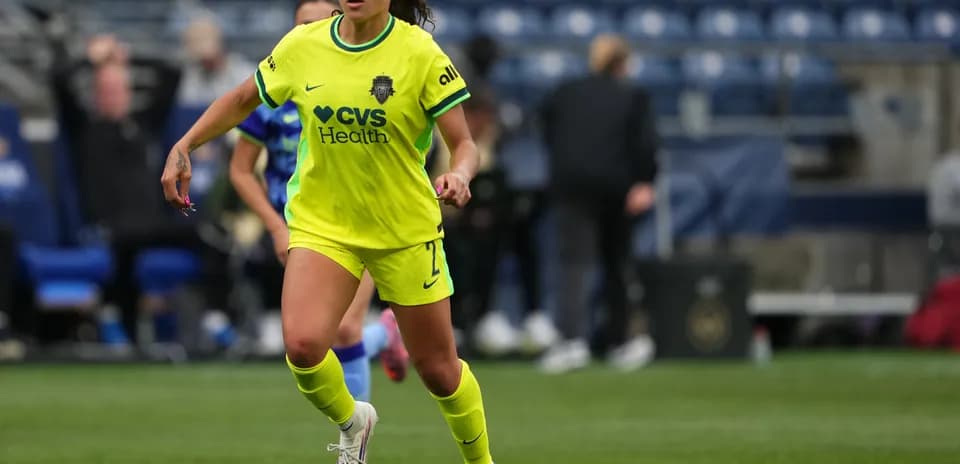 Player dribbling ball during NWSL match
