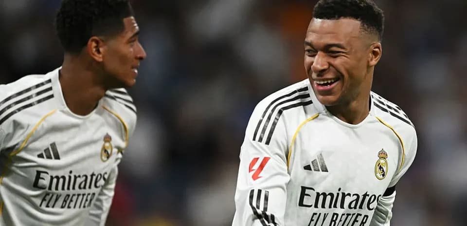 Two Real Madrid players celebrating during match