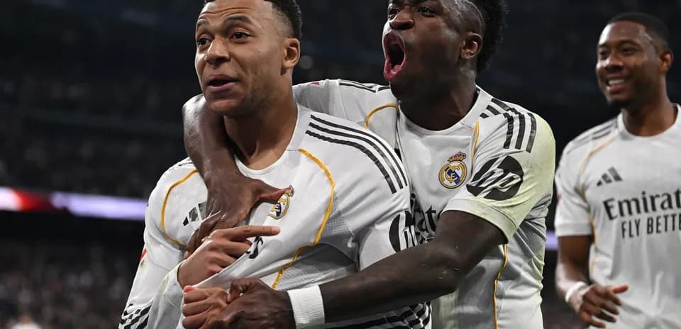 Real Madrid players celebrating a goal