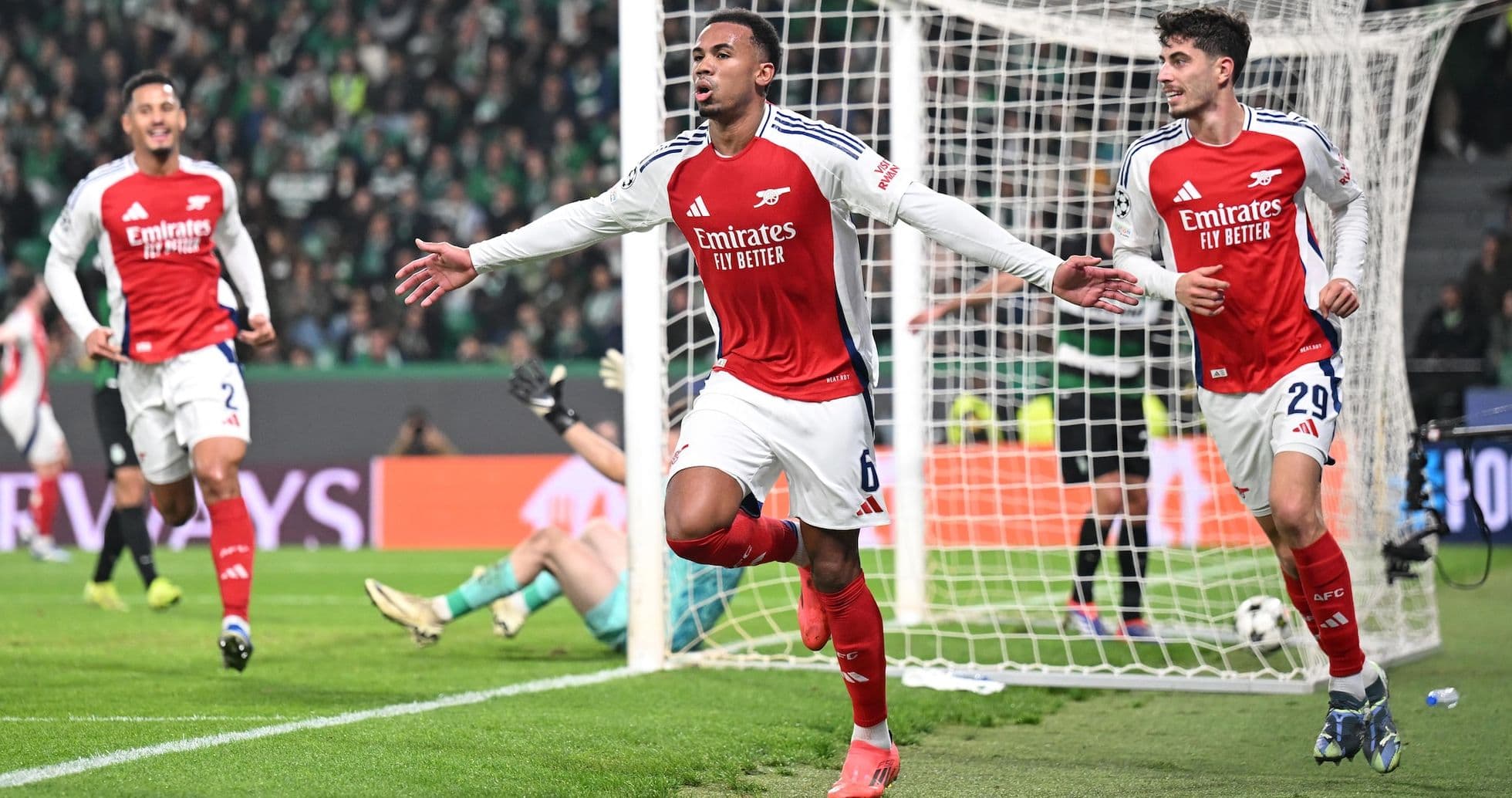 Arsenal players celebrating a goal against Sporting CP