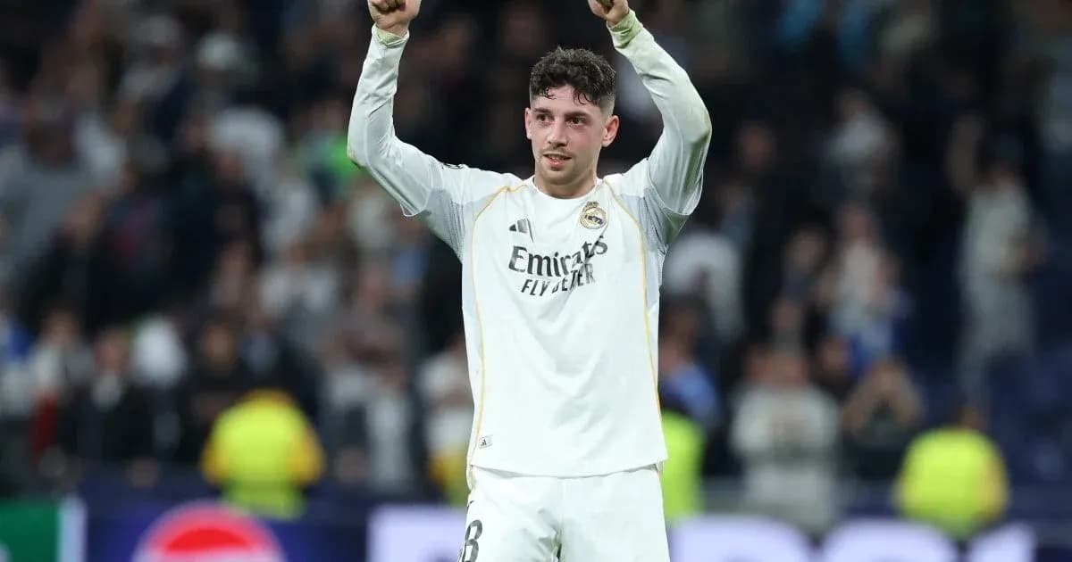 Player celebrating with raised arms after match