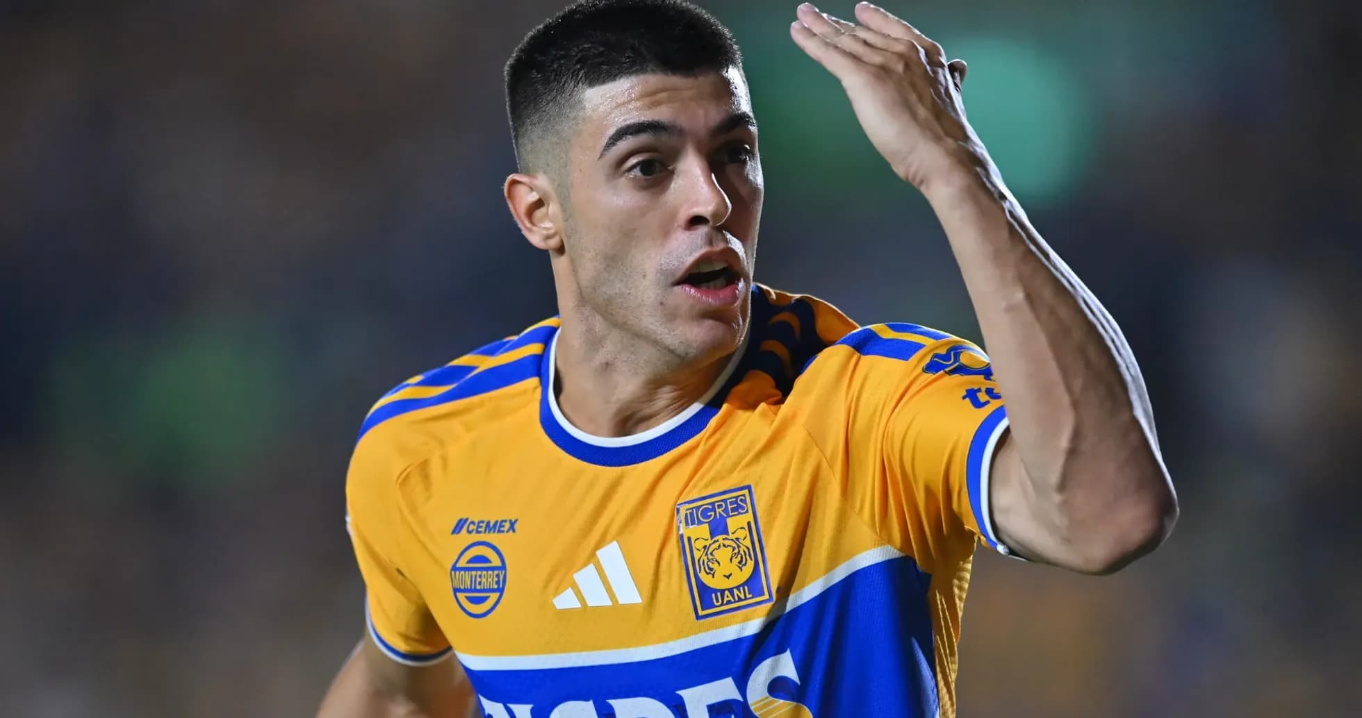 Tigres UANL player celebrating during match