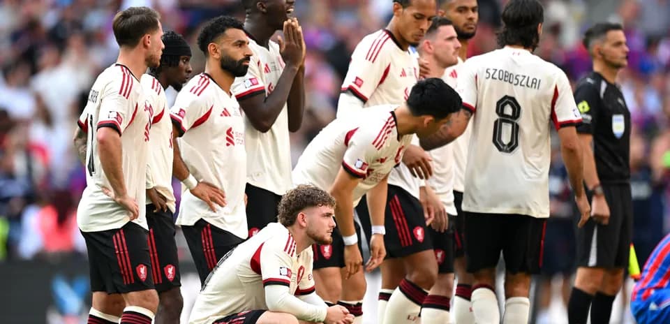 Players in white jerseys standing in a line