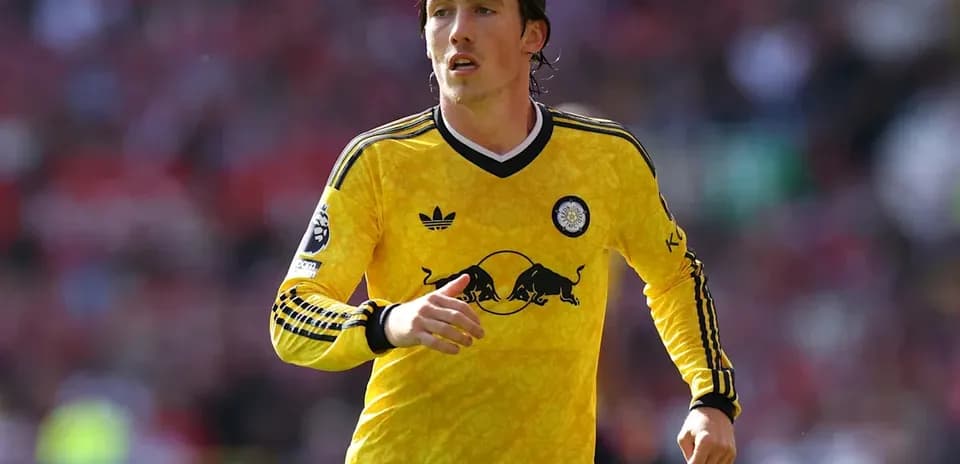 Player in yellow jersey running on the field