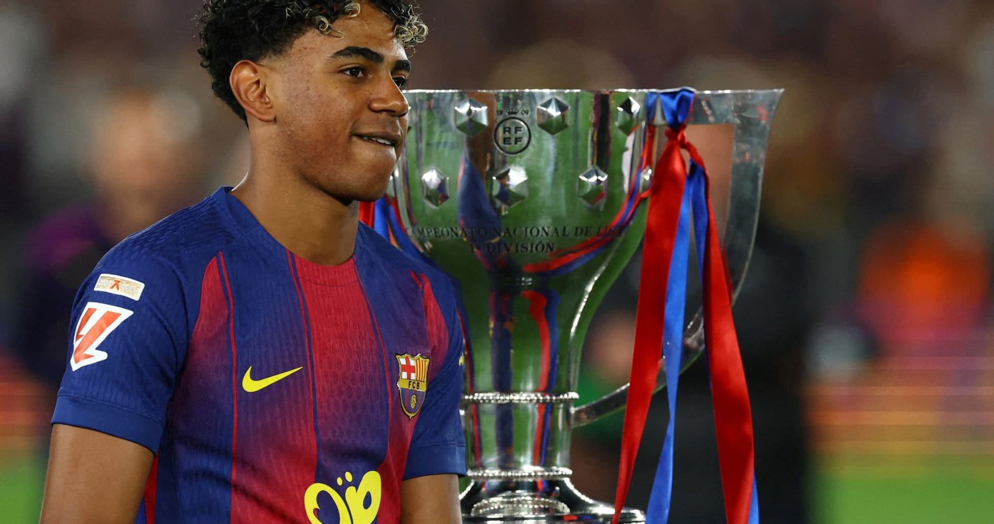 Player celebrating with trophy after match