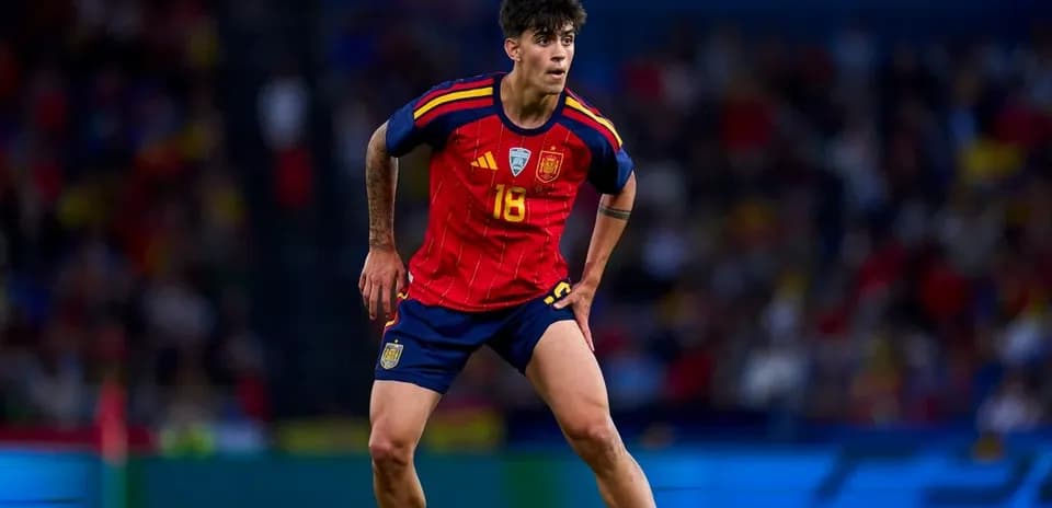 Player in Spain kit during a match action