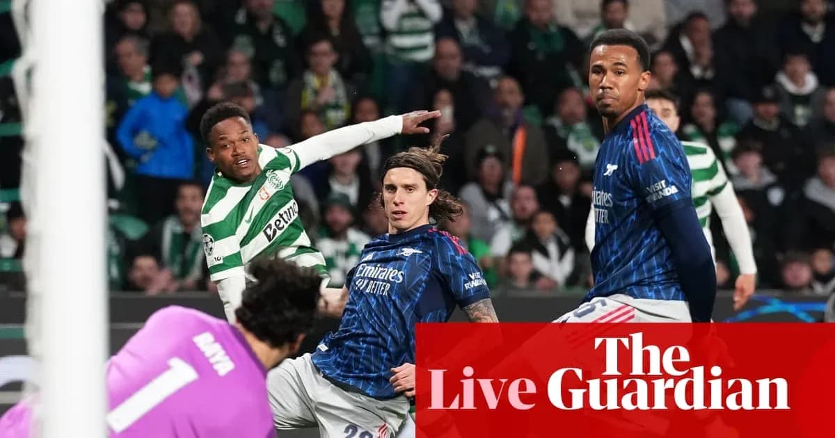 Celtic player shooting at goal with defenders nearby