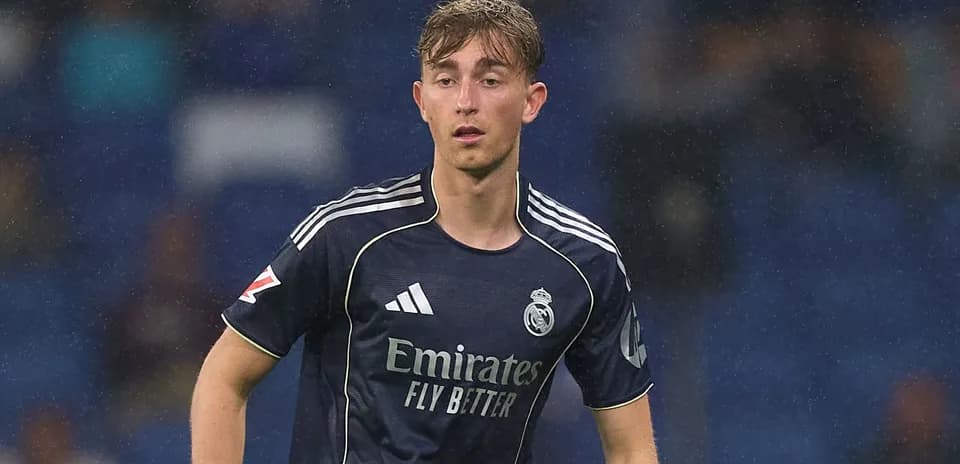 Player in Real Madrid kit during match action