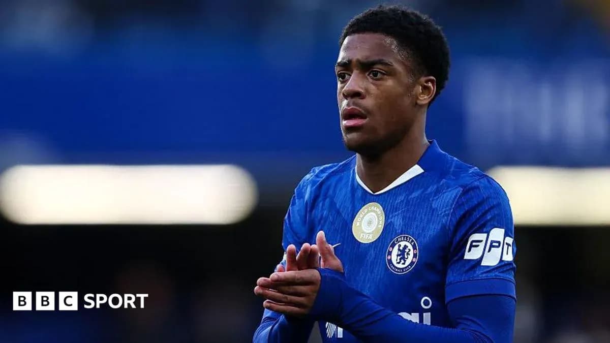 Chelsea player clapping during match at stadium
