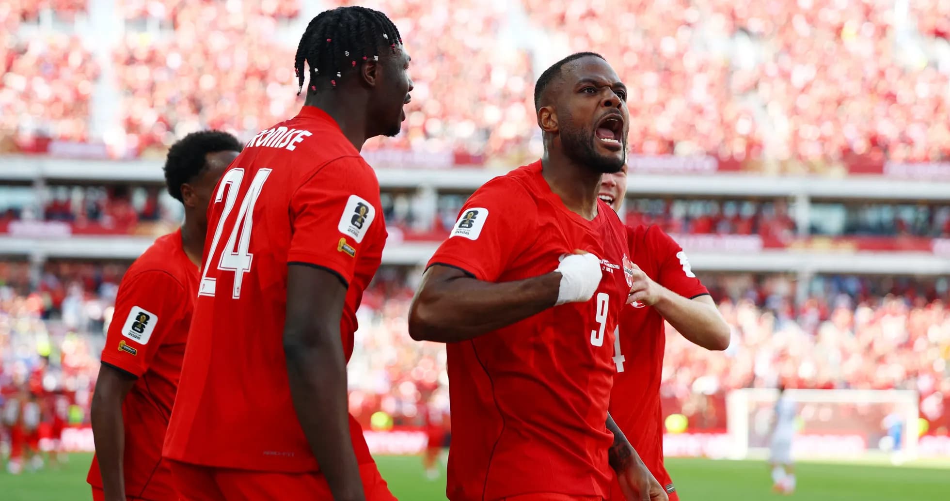 Canadian players celebrating a goal during match