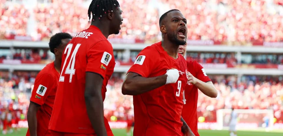 Canadian players celebrating a goal during match