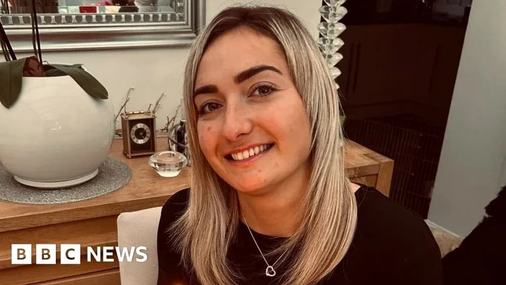 Smiling person sitting indoors with decor