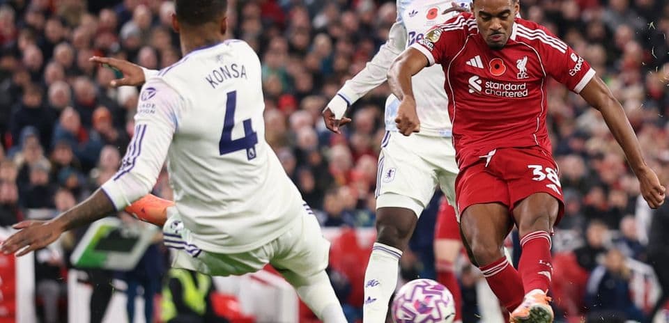 Liverpool player shooting during Aston Villa match