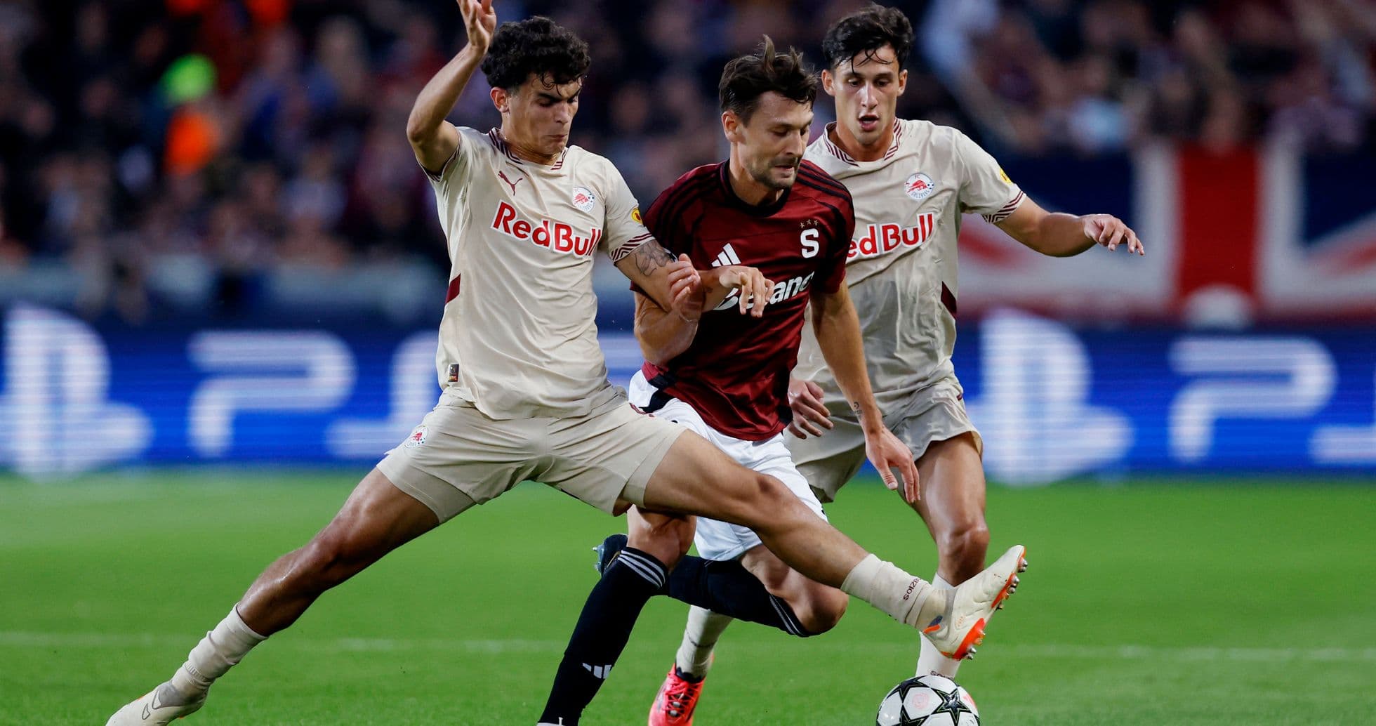 Two players challenging for the ball in match