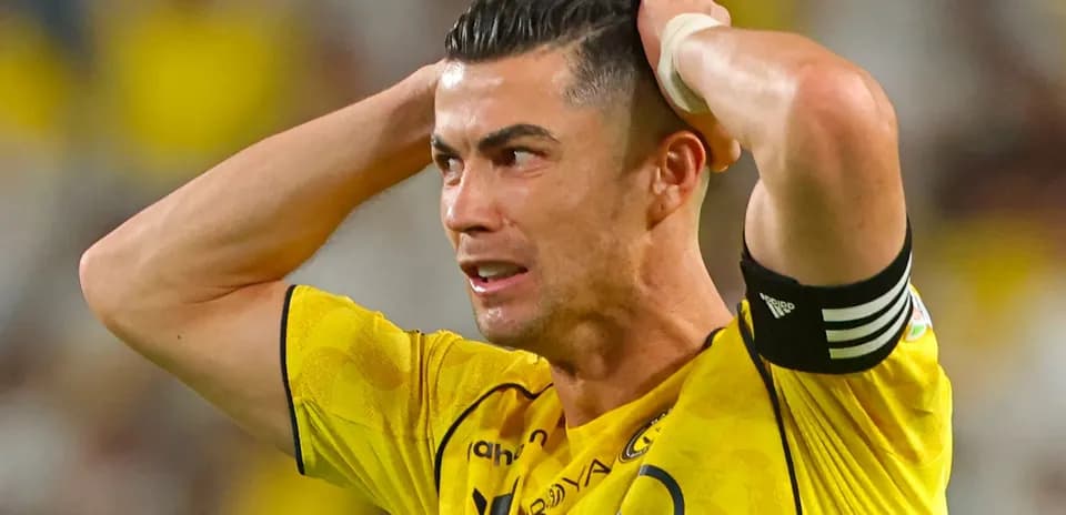 Player in yellow jersey reacting during a match