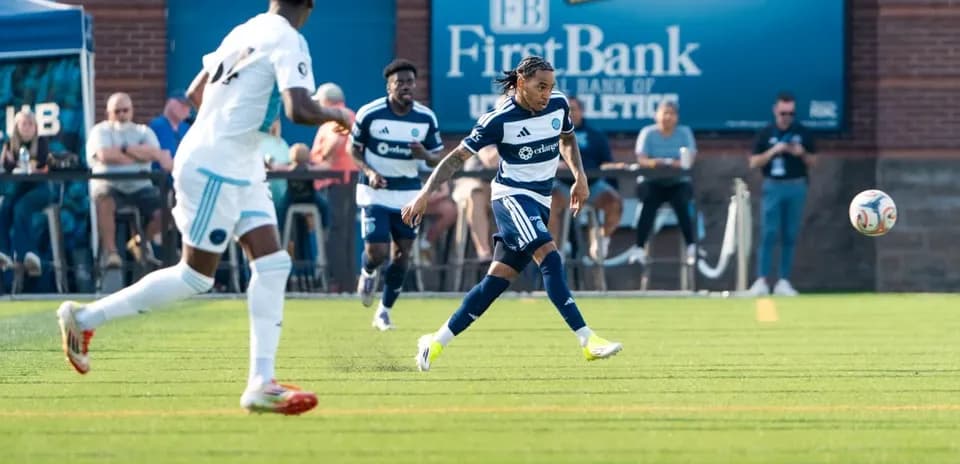 Crown Legacy players competing for the ball