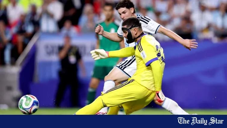 Goalkeeper attempting to save a shot on goal