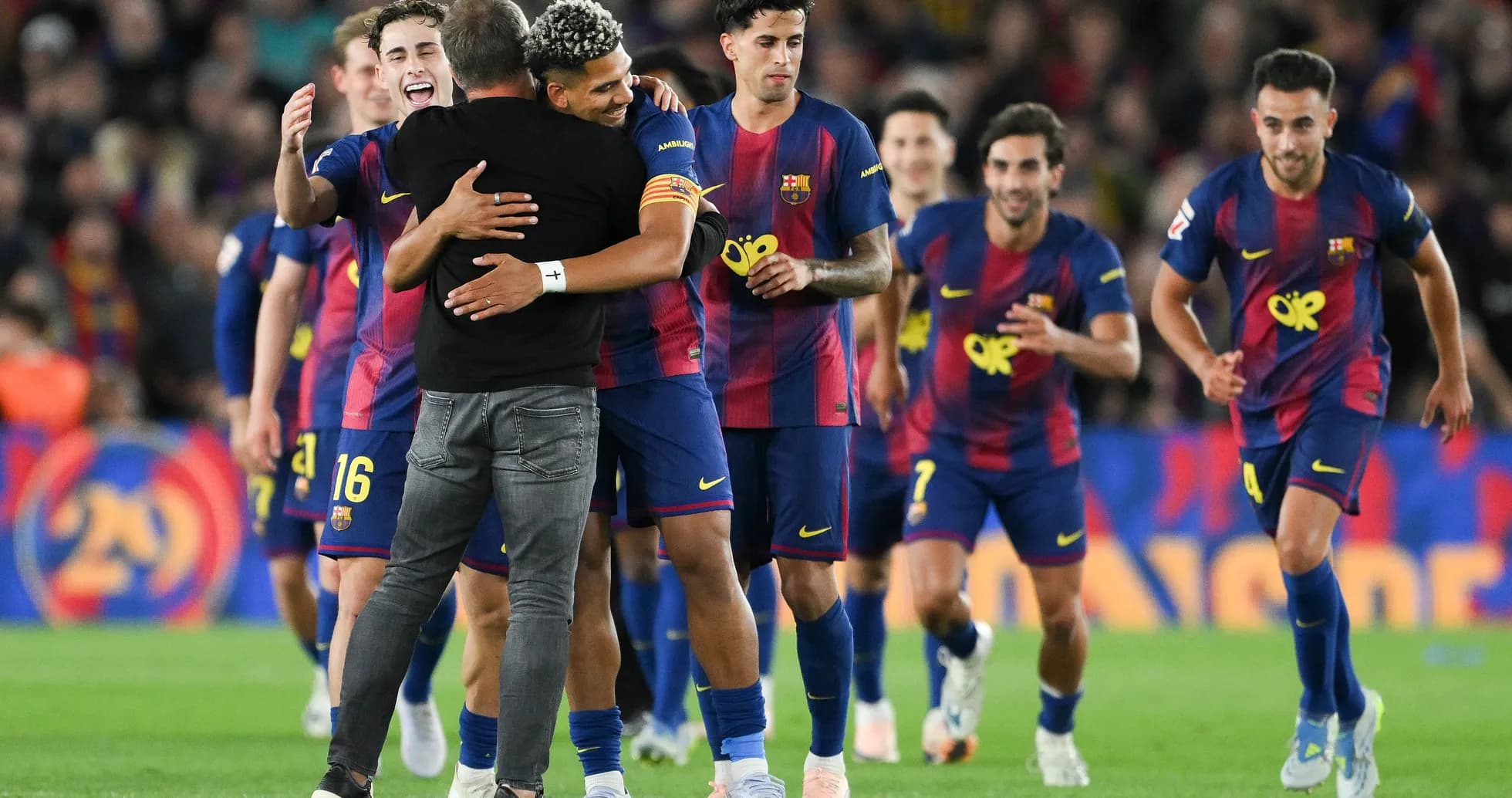 Barcelona players celebrating after a match victory