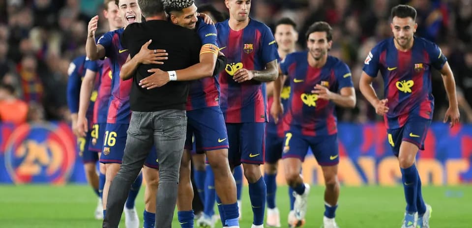 Barcelona players celebrating after a match victory