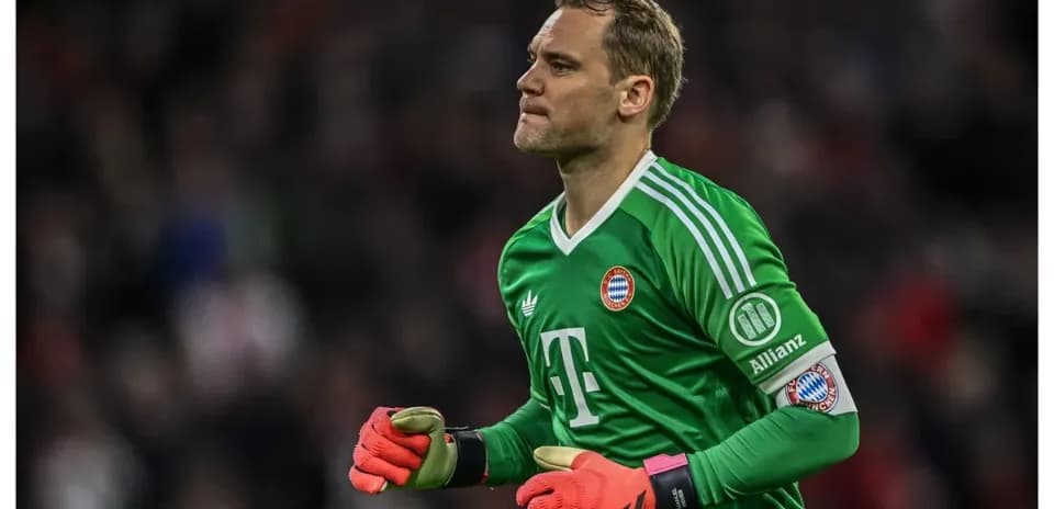 Goalkeeper in green kit running during match