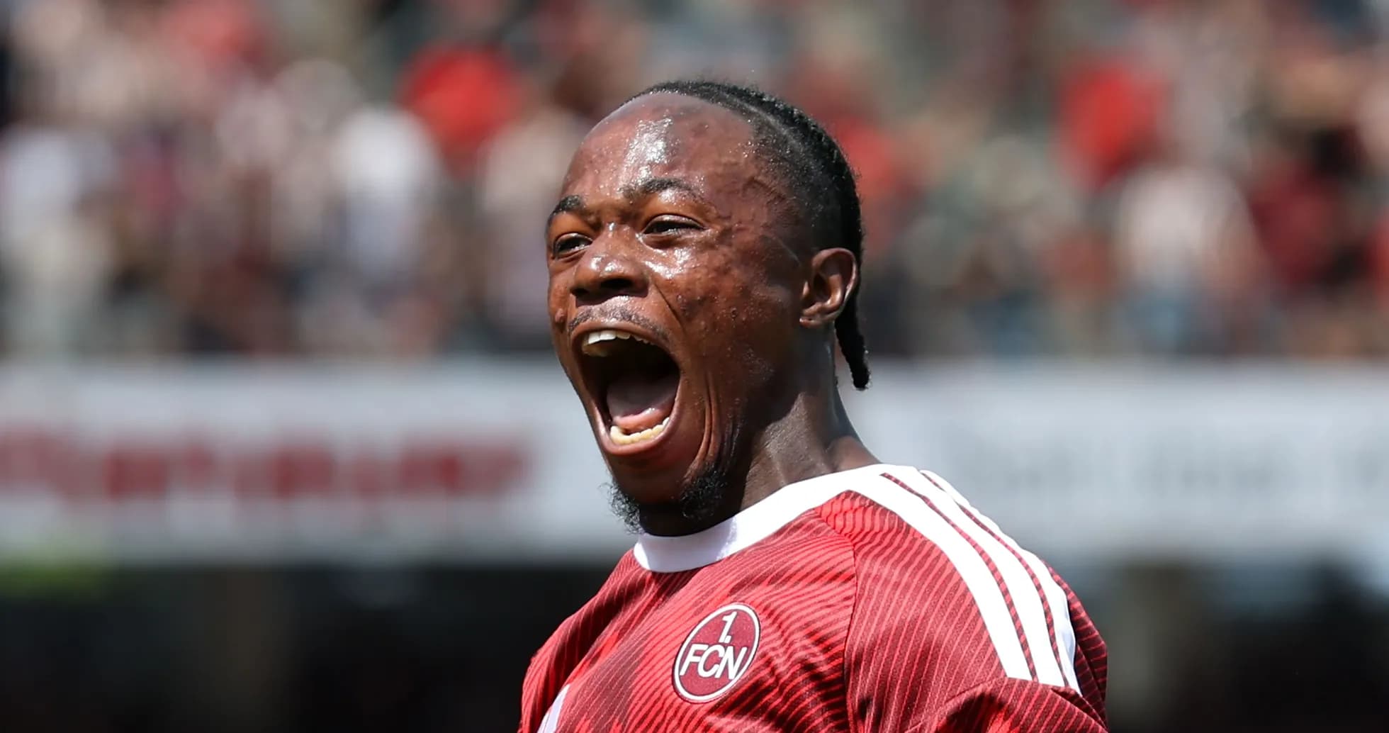 Player celebrating passionately after scoring a goal