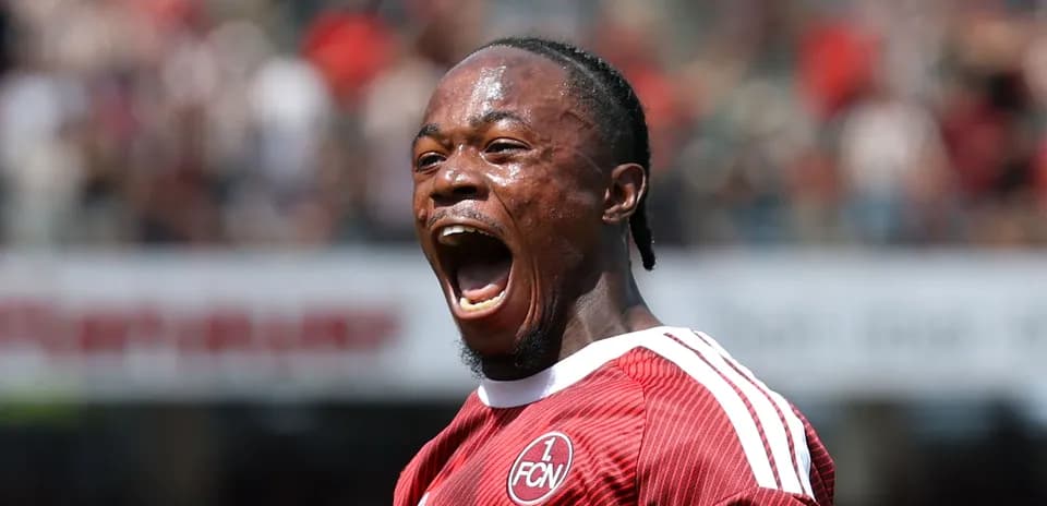 Player celebrating passionately after scoring a goal