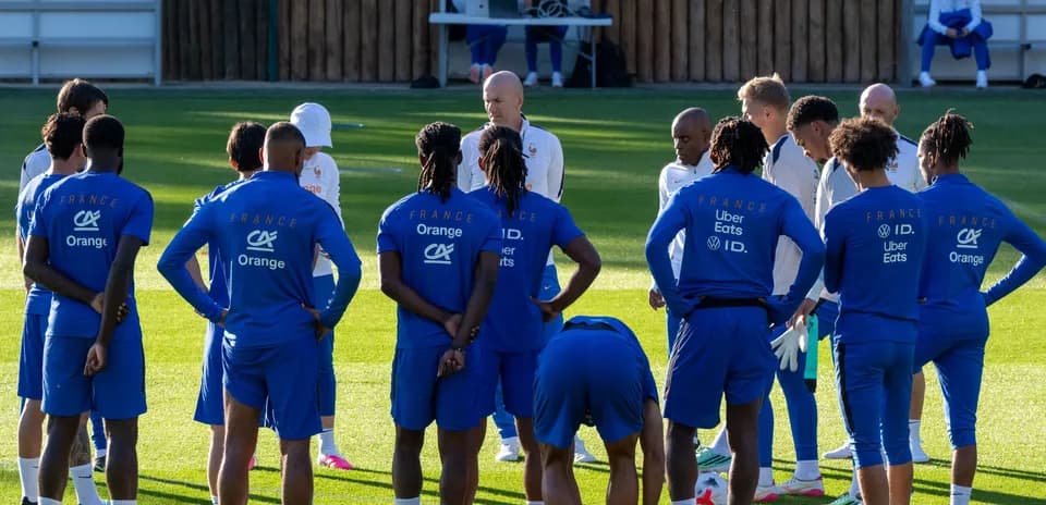 French football team gathered for training session briefing