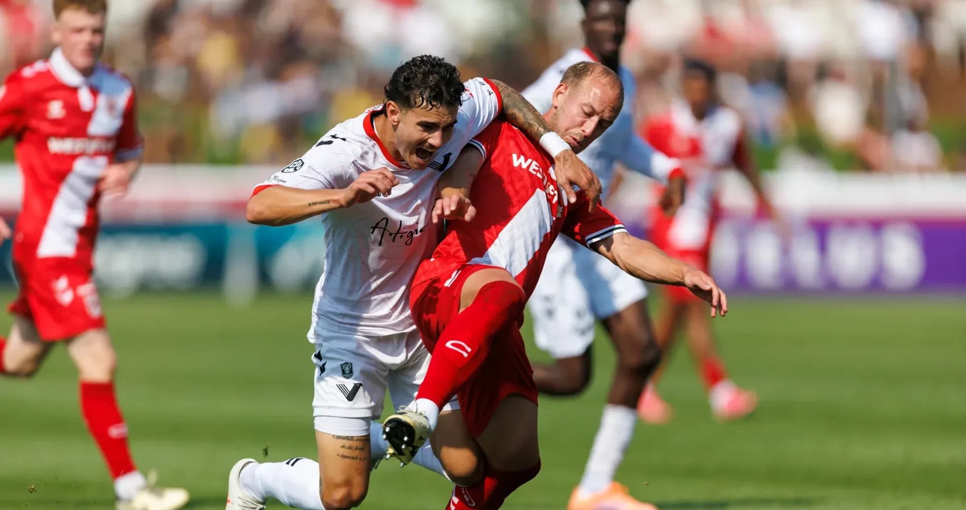 Cavalry FC and Vancouver FC players in action