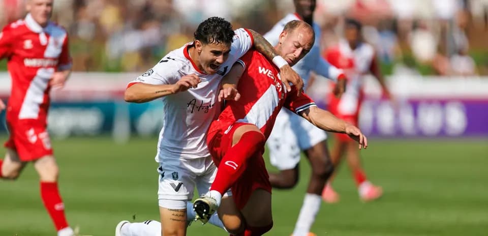 Cavalry FC and Vancouver FC players in action