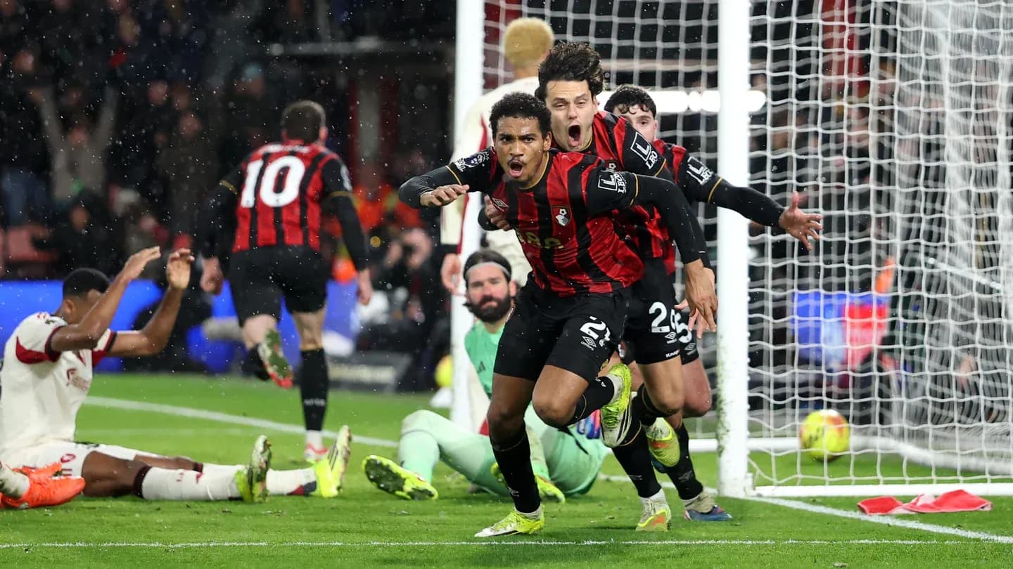 Bournemouth players celebrating a goal against Liverpool