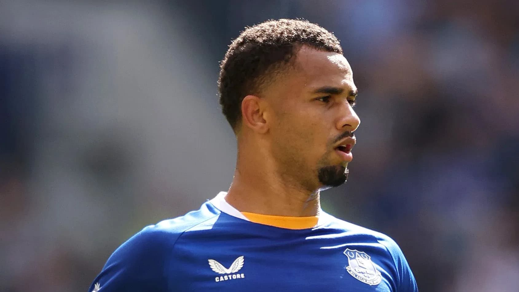 Player in Everton jersey during match action