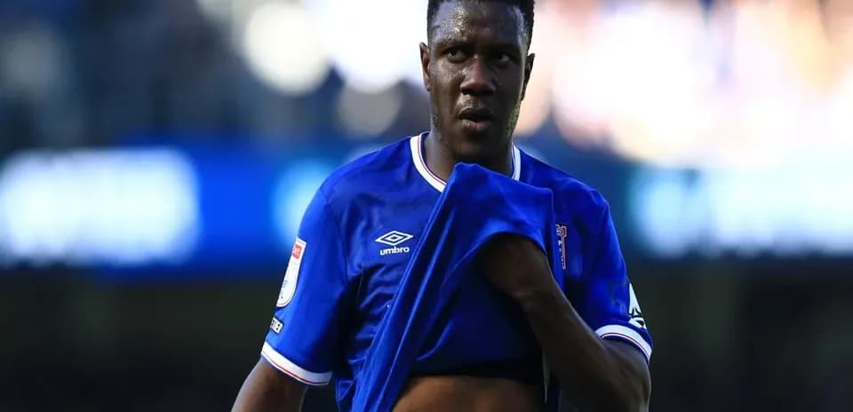 Player removing jersey during match at stadium