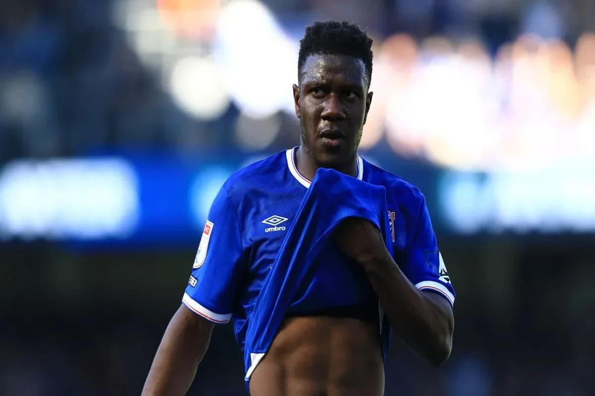 Player removing jersey during match at stadium
