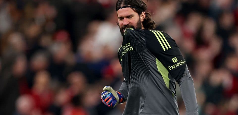 Goalkeeper celebrating during a match with fans