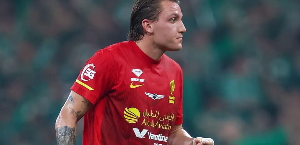 Player in red jersey during a football match