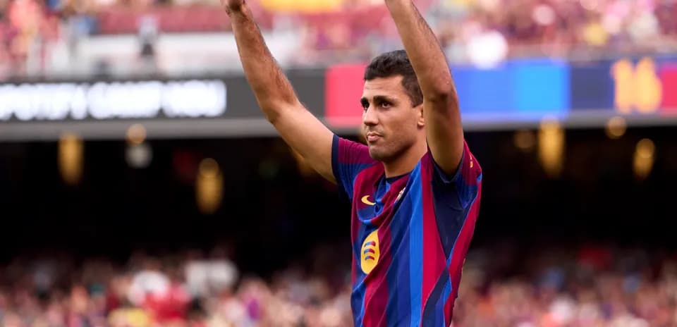 Player celebrating in front of cheering crowd