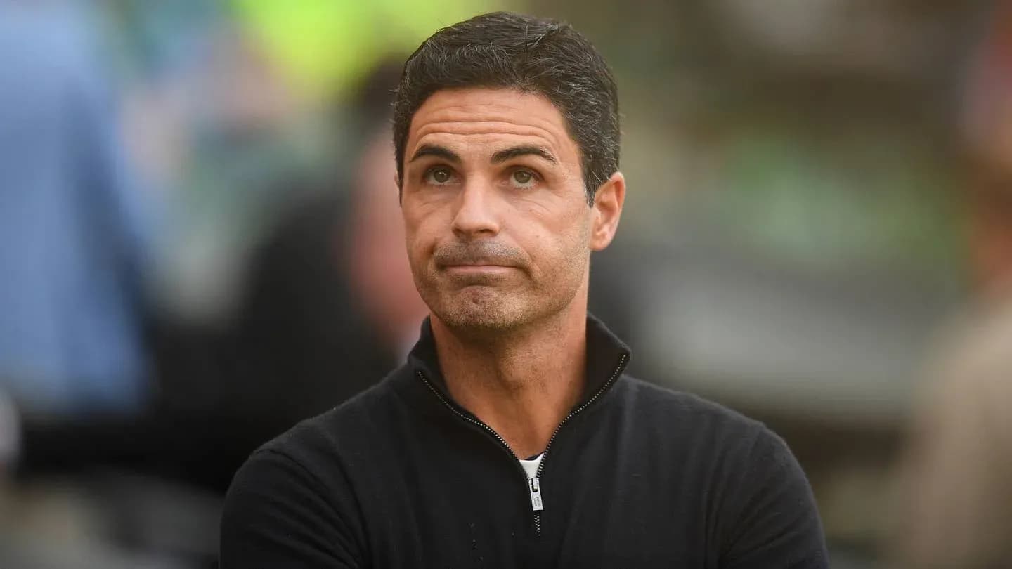 Manager observing match from the sidelines