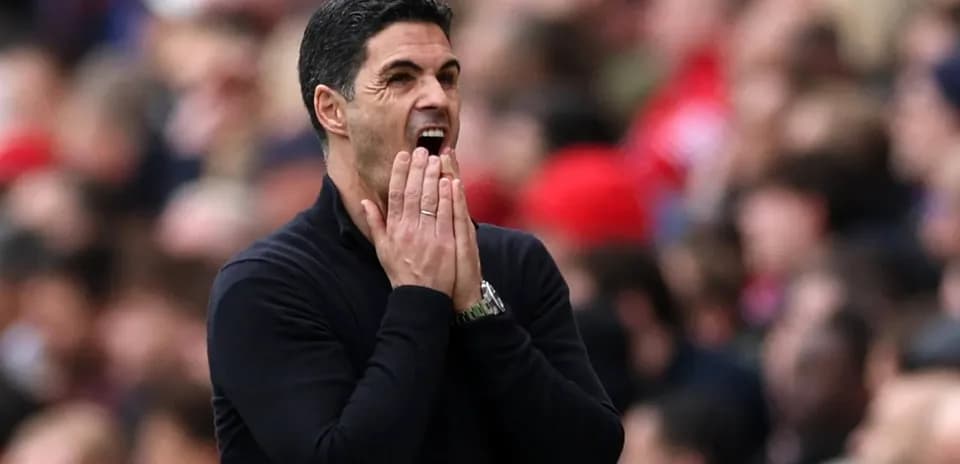 Manager reacting during a match on the sidelines